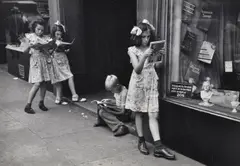 Comic book readers by Ruth Orkin, print, offered Apr 2019