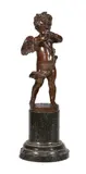 A patinated bronze and marble mounted model of an Amorino by Bruno Kruse, bronze and marble, sold Jan 2019