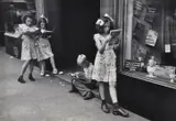 Comic book readers by Ruth Orkin, print, offered Dec 2018