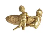 A gilt bronze group of two children beside a large basket by Raoul Larche, bronze, offered Oct 2018