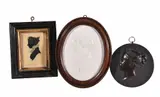 An oval plaster relief plaque a young lady by Mary Pownall, 1914, oil, offered Apr 2018