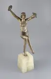 An Art Deco patinated bronze figure of a cymbals dancer by Henri Fugere, bronze, sold Dec 2020