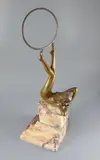 An Art Deco patinated bronze figure of a naked hoop by Claire Jeanne Roberte Colinet, bronze, sold Dec 2020