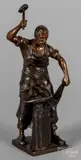 of a blacksmith by Spiro Schwatenberg, bronze, sold Jan 2019