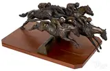 of four jockeys on horseback by Jean Clagett, bronze, offered Jan 2019