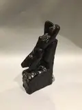 Nu agenouillé by Yvonne Serruys, Épreuve en bronze patiné, sold Mar 2021