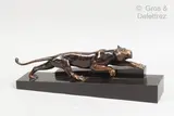 Panthère à l’affût by Georges Lavroff, Epreuve en bronze à patine foncée nuancée vieil or reposant sur une base de marbre noir, sold Mar 2021