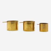 Cylinda revolving ashtrays, set of three by Arne Jacobsen, 1964, brass, sold Aug 2022