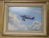 Swordfish bi-plane in flight by Roy A. Nockolds, oil on board, sold Nov 2020