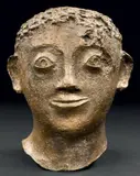 Tête d'homme by André Derain, Bronze à patine dorée, sold Mar 2013