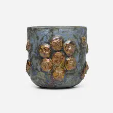 Vessel with faces by Beatrice Wood, c. 1980, volcanic and lustre-glazed earthenware, sold Jan 2026