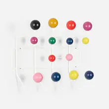 Hang-It-All by Charles and Ray Eames, lacquered wood, enameled steel, sold Aug 2022