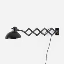 Scissor wall lamp by Christian Dell, c. 1935, enameled steel, Bakelite, aluminum, sold Aug 2022