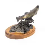 Trout Fishing by Frank DiVita, bronze with wood base and glass tube with matchstick and lures, sold Sep 2024
