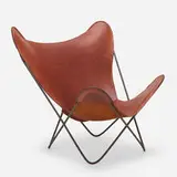 Butterfly chair by Juan Kurchan and Jorge Ferrari Hardoy Antonio Bonet, 1947, enameled steel, leather, canvas, sold Aug 2022