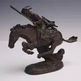 Bronze Sculpture by Frederic Remington Art Museum, Dramatic bronze-finish resin sculpture titled The Cheyenne, sold Jul 2025
