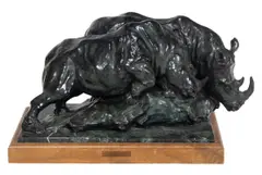 Rhino at Chiziara by Sherry Salari Sander, 1983, bronze sculpture with verdigris patina on wood base, sold May 2025