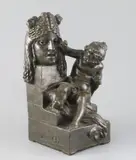 A bronzed terracotta group of putto beside a classical mask by Joseph Gustave Chéret, sculpture, sold May 2020