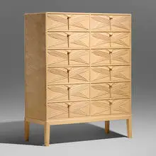 Dragonfly chest of drawers by Judy Kensley McKie, 1987, carved and lime-washed birch, sold Jan 2026