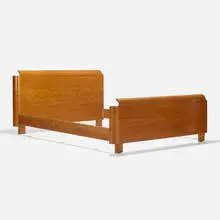 Full-size bed by Paul Goldman, c. 1945, walnut plywood, walnut, sold Aug 2022