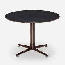 Dining table by Henry Michael Dunbar, c. 1965, rosewood, laminate, aluminum, sold Aug 2022
