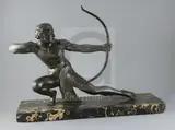 An Art Deco bronze figure of an archer, on variegated marble plinth, W.24in by Salvatore Melani, bronze, sold Mar 2020