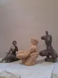 Nu assis by Zdenk Pikryl, Plâtre patine verte nuancé rouge, sold Oct 2022