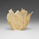 46K Leaf Bowl by Kay Sekimachi, 1997, laminated Northern red oak leaves and handmade Japanese paper with bark flecks, sold Jan 2026
