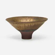 Exceptional footed bowl by Lucie Rie, c. 1980, manganese-glazed porcelain with turquoise band and sgrafitto decoration, sold Jan 2026