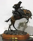 Tripped Up by James Regimbal, 1987, bronze sculpture, sold Jul 2025