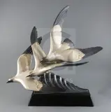 An Art Deco silvered bronzed group of three seagulls swooping over a wave by Alexandre Kéléty, sculpture, sold Dec 2019