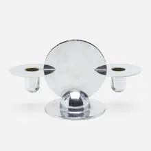 Disc candlestick, model #24005 by Ruth Gerth, c. 1930, chrome-plated brass, sold Jul 2022