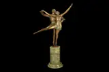DANCERS'the male and female figures dancing together with arms raised, on a circular base, the base signed 'ZACH by Bruno Zach, BRONZE, offered Jun 2021