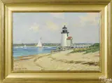 of a coastal scene with a lighthouse by Stapleton Kearns, oil on canvas, offered Nov 2016