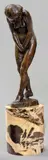 Jeune femme nue souriante by Georges Halbout du Tanney, Épreuve en bronze à patine brune signée sur la terrasse, sold Jun 2010
