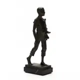 Bronze Boy Striding with Boots by Adolf Josef Pohl, Patinated cast bronze, sold Oct 2022