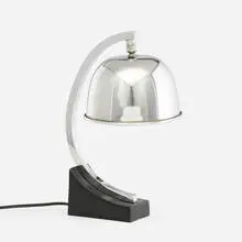 Table lamp by attribution Donald Deskey, c. 1930, chrome-plated metal, enameled metal, sold Jul 2022