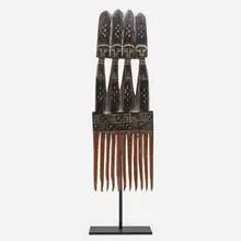 Monumental comb by African, carved wood, sold Jul 2022