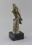 A green patinated bronze model of a falcon perched upon a tree stump by Irénée Rochard, bronze, sold Mar 2019
