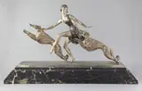 An Art Deco patinated bronze group of a young lady with a pair of borzois, 'The Dance by Jean Lormier, bronze, sold Mar 2019