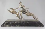 An Art Deco patinated bronze group of a young lady with a pair of borzois, 'The Dance by Jean Lormier, bronze, sold Mar 2019