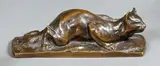 Chat allongé aux aguets by Charles Louis Eugène Virion, Épreuve en bronze à patine brune, sold May 2012