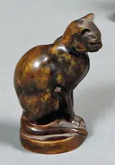 Chat assis by Max Le Verrier, Épreuve en bronze à patine brune, sold May 2012