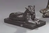 Lionne couchée by Georges Lucien Guyot, Bronze à patine brun vert nuancée, sold Nov 2010