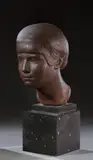 & Georges SERRE (1889-1956) & ROUARD PARIS (éditeur) « Portrait de jeune fille by Gaston Contesse, Épreuve en grès à patine rougeâtre ocre sur socle quadrangulaire en marbre noir, sold May 2022