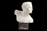 A 1920's alabaster and marble bust of greek athlete by Otto Poertzel, sculpture, offered Mar 2021
