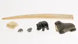 Untitled by Vintage Walrus Tusk, Carved Wood Walrus and 3 Carved Stone Bears, sold Oct 2024