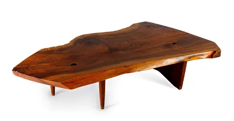 Slab Coffee Table by George Nakashima, circa 1967, American black walnut, sold Sep 2026