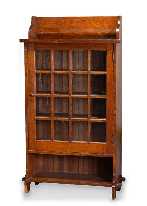 A Rare Single-Door Oak Bookcase with Carved Crest by Roycroft, circa 1905, Quarter-sawn oak, sold Sep 2026