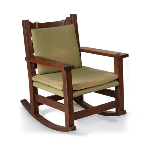 An Oak Slat-Back Rocking Chair, Model No. 2615 by Gustav Stickley, sold Sep 2026